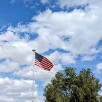 American flag flying at the Rosewood Arabians ranch